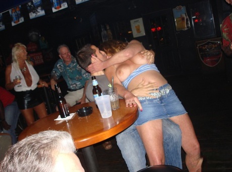 Mature swinger Tracy Lick and girlfriends seduce men at a cheap beer joint 41743378