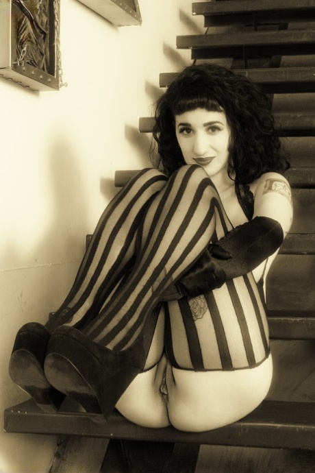 Busty goth Arabelle Raphael shows her big butt and pussy in sexy stockings 59879468