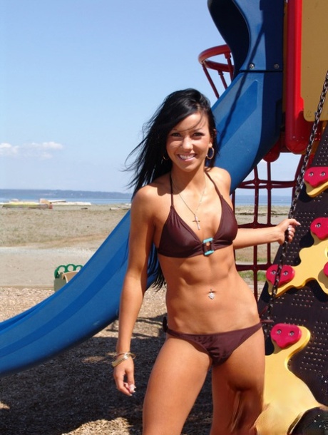 Brunette amateur Trista Stevens fingers her pussy while at a beach playground 76393963