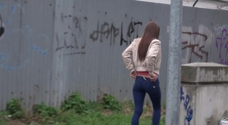 Cynthia Vellons takes an urgent piss on a cobblestone street 75101886