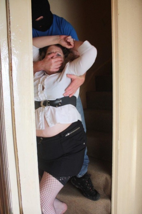 Fat woman is rendered helpless by the maintenance man before being tied up 14816080