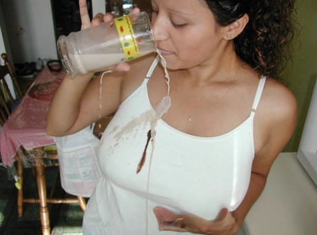 Latina amateur covers her big natural tits in syrup while in the kitchen 58357086