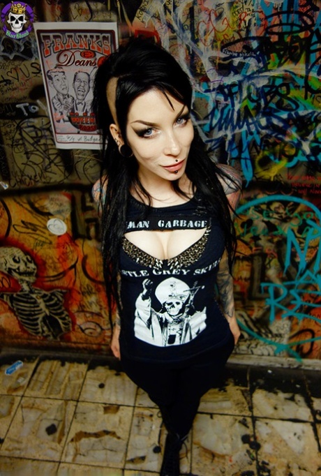 Goth girl Razor Candi strips to OTK boots in graffiti filled bathroom 19683557