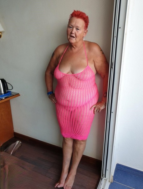 Fat nan with short red hair finger spreads her pussy on oceanside balcony 57936114