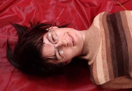 Brunette girl is hogtied while fully clothed and wearing glasses 71943335