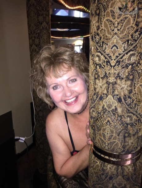 Mature woman Busty Bliss drinks wine while showing her natural breasts 19869001