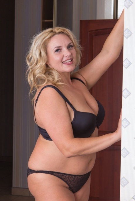Overweight blonde housewife fingers her wet beaver after disrobing 79066634