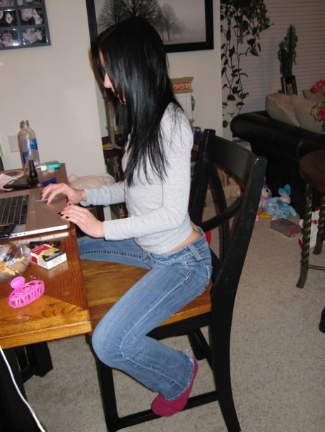 Brunette girlfriend Dawn Avril is caught around the house in candid moments 19333314
