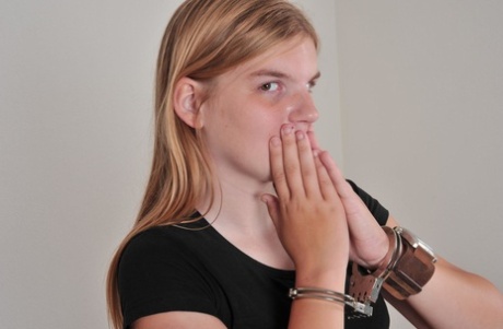 Amateur model Lisa L wears a huge OOZOO cuff watch while handcuffed 36579418