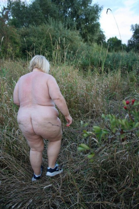 Obese British woman Lexie Cummings gets naked while out in the country 55887839