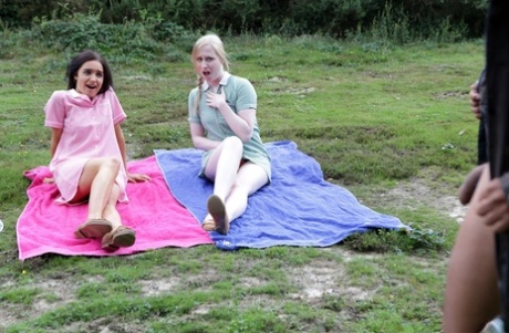 British girls give a CFNM handjob in a clearing near the woods 99521322