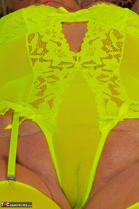 Blonde granny Sparkle looses her saggy tits from neon lingerie 67889870