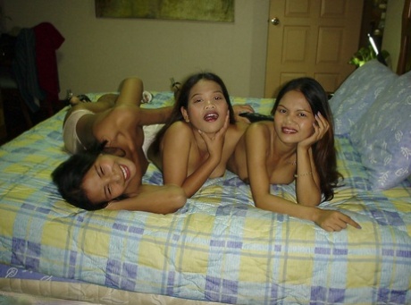 Cute Asian lesbian has exciting adventure with her young friends 82935976