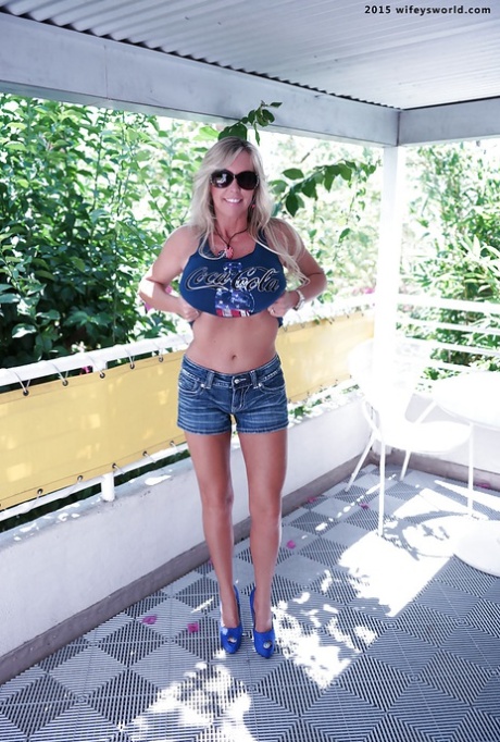 Beautiful blonde housewife Sandra Otterson flashing her big knockers 56038264