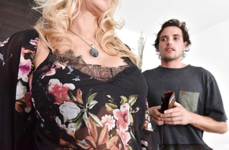 Blonde MILF Katie Morgan revealing big tits before fucking younger man 86778541