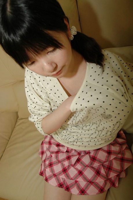 Asian teen in knee socks taking off her panties and exposing her shaved gash 34518463