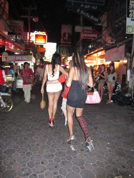 Ladyboy prostitutes head out looking for sex dates in high heels 51971306